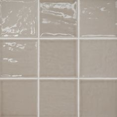 With its gentle, uneven body and high-gloss finish, light dances across the tile like the sun on the ocean, creating a serene, shimmering look. Made in Spain, this ceramic tile comes in a pack of 51 pcs that covers 5.49 sqft - Sold by Carton (Actual sht/pc size: 4 x 4). Applicable for Walls, Shower Walls. Bedrosians Marin Coastal Cliff (Taupe) 4-in x 4-in Glossy Ceramic Subway Wall Tile (5.49-sq. ft/ Carton) | 100003166 Aloe Green, Glazed Ceramic Tile, Pebble Grey, Grey Ceramics, Porcelain Mosaic, Ceramic Wall Tiles, Color Tile, Mosaic Wall, Floor And Wall Tile