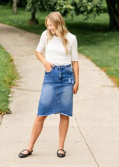 The Tiana Distressed Denim Midi Skirt is a modest and cute denim midi skirt! Designed with backed distressing at the front and back pockets, an uneven raw hem, 5 pockets for holding all the things, and a classic button zipper closure. Style: distressed, denim, midi length Color: Denim Quality control is of the utmost importance to us. Our sizing is always approximate and can also depend heavily on your own body shape. Just like no two people are the same, the same goes for skirts, dresses + tops Dark Wash Distressed Cutoff Denim Skirt, Distressed Dark Wash Cutoff Denim Skirt, Knee-length Denim Skirt With Frayed Hem In Medium Wash, Knee-length Medium Wash Denim Skirt With Frayed Hem, Knee-length Denim Skirt With Frayed Hem, Medium Wash, Medium Wash Knee-length Skirt With Frayed Hem, Knee-length Denim Blue Skirt With Frayed Hem, Knee-length Denim Skirt With Frayed Hem, Cutoff Denim Skirt With Frayed Hem For Day Out