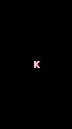 a pink arrow pointing to the left on a black background with text below it that reads k