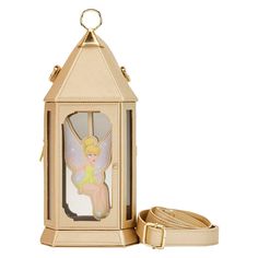 PRICES MAY VARY. Style #: WDSSTB0024 Material: Faux Leather Measurements: W 4.5" x H 912" x D 6" Wipe clean Tinkerbell Lantern, Disney Themed Outfits, Tema Disney, Peter Pan And Tinkerbell, Loungefly Bag, Vintage Lanterns, Loungefly Disney, Metallic Bag, Captain Hook