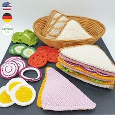 crocheted food items displayed on table with basket and flag in the back ground