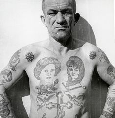 an old man with tattoos on his chest