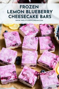 frozen lemon blueberry cheesecake bars on a cutting board