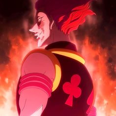 an anime character with red hair standing in front of flames