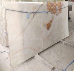 a large marble slab is being worked on