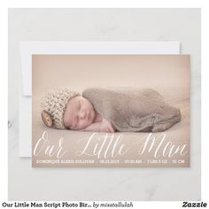 a birth announcement card with a photo of a baby sleeping on top of a blanket