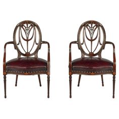 a pair of chairs sitting next to each other