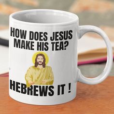 a white coffee mug with the words how does jesus make his tea? hebrews it