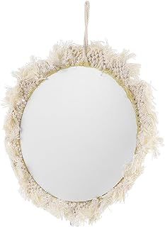 a round mirror hanging on a rope with white feathers around the edges and an oval mirror in the middle