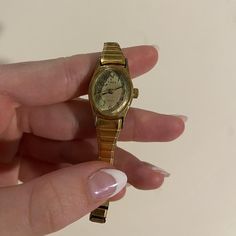 vintage timex gold watch
so dainty and cute
doesn’t work can be fixed - has some wear on the face but adds character 
so pretty I Am Manifesting, Women's Watch, Gold Watch, Womens Watches, 10 Things, Gold