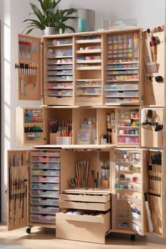 a wooden cabinet filled with lots of crafting supplies