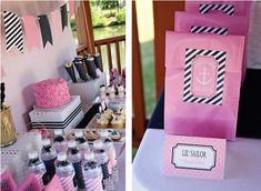 a table topped with pink and black bags next to cupcakes on top of plates