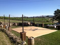 an outdoor dance area in the middle of a field