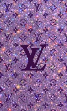 the louis vuitton logo is shown on a purple background with glittery stars