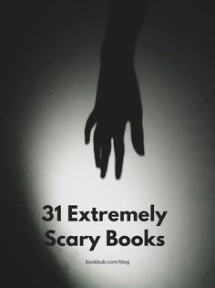 the shadow of a person's hand with text that reads 31 extremely scary books