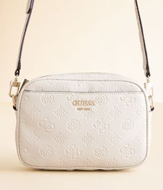 Guess Vikky II Crossbody Purse - Cream , Women's Stone Logo Embossed faux leather fabric lined purse Zipper closure Interior zipper and two pouch pockets Removable shoulder strap Dimensions: 9 1/2(L) x 2 1/2(W) x 6 1/2(H). 100% Polyurethane. Lining: 80% Polyester 20% Cotton. Apparel & Accessories Stone Logo, Guess Purses, Small Camera, Super Gifts, Elegant Bags, Guess Bags, Purse For Women, Faux Leather Fabric, Leather Fabric