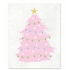 a pink christmas tree with lights on it