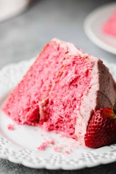 a slice of strawberry cake on a white plate