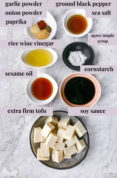 the ingredients to make this recipe are displayed on a marble counter top, including olive oil, garlic powder, ground black pepper, and paprika