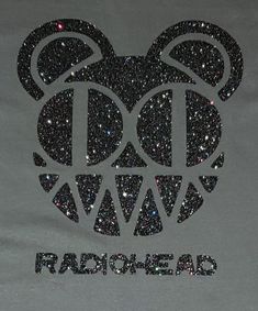 a mickey mouse head with the word radiohead on it's side and glittered letters