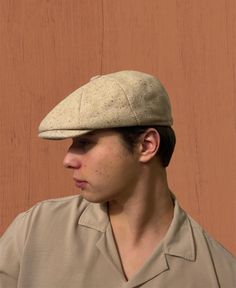 Embrace timeless style with our Milky Brown 8 Panels Cap, a handcrafted masterpiece inspired by the iconic Peaky Blinders. This vintage wool hat, with a touch of Irish flat cap influence, is more than an accessory; it's a statement piece that exudes classic charm and warmth. Discover The Versatility Of Our Hat: -Classic 8 panels design for a vintage look -Handmade with care for superior craftsmanship -Versatile baker boy hat suitable for winter fashion -Ideal Peaky Blinders hat for men with a taste for style -Warm wool hat perfect for chilly days -Unique milky brown color for a distinctive appearance Discover the elegance of our ladies' vintage hat, reminiscent of 1920s fashion. This newsboy cap, also a flat cap, adds a sophisticated touch to your winter wardrobe. Winter Hat & Christmas Gi Vintage Beige Baseball Cap With Flat Brim, Retro Beige Hats For Outdoor, Retro Beige Hat For Outdoor, Classic Beige Flat Cap Beret, Classic Beige Flat Cap, Beige Wool Cap, Adjustable Brimmed Beret For Outdoors, Retro Beige Flat Cap, Vintage Beige Hat For Outdoors