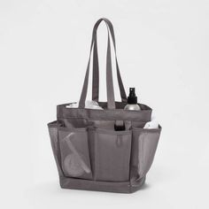 a gray tote bag with bottles in it