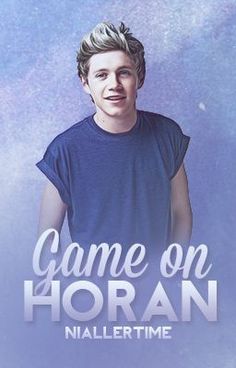 a young man standing in front of a blue background with the words game on horan