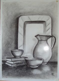 a drawing of a pitcher, bowl and plate on a table next to a stack of books