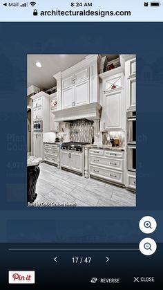 an image of a kitchen with white cabinets and marble counter tops on the phone screen