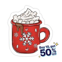 a red mug filled with hot chocolate and marshmallows on top of it