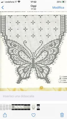 a cross stitch pattern on the back of a cell phone showing an image of a butterfly