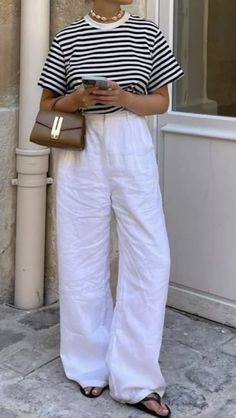 linen pants summer travel outfits Greece Outfit Ideas Summer, White Linen Pants Outfit Summer, White Floral Dress Outfit, White Swimsuit Outfit, Dress Travel Outfit, Greece Outfit Ideas, Linen Pants Outfit Summer, Blue Top Outfit, White Linen Pants Outfit