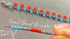 the bead bracelet is being worked on by someone