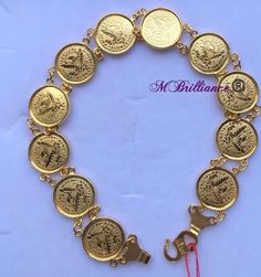 Majestic queen coins bracelet 916 Yellow Gold Purity : 916 GOLD purity Weight : 7.49 grams Length: 7.2 inches Appx Size : (pls see pic with ruler) Colour : YELLOW GOLD Hallmark : Hallmarked 916 Hook : s hook Colour: yellow gold Design : beautiful queen coins bracelet design. Authentic 916 gold FAQs Q: Is it real gold? A: yes it's real authentic genuine 916 gold Q: can pawn? A: yes it's pawnable ⭐️GoForGold⭐️ 22k Gold Jubilee Bracelet, 22k Gold Jewelry, Coin Bracelet, S Hook, Bracelet Design, Chain Anklet, Gold Design, Heart Of Gold, Chain Link Bracelet