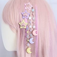 Dreamy moon magic! Shimmering moon and star themed hair clips; use them to keep stray hairs in place or just to infuse your hair with a touch of kawaii. Check out the matching necklaces here: https://www.etsy.com/uk/listing/1745777309/fairy-kei-necklaces-kawaii-moon-and-star Measurements: Overall clip length (approx.):  5.1" / 13cm Star clip size (approx.): W 1.2" x 1.2" / W 3cm x H 3cm Moon pendant size (approx.): W 0.8" x 0.8"  / W 2cm x H 2cm Small parts may pose a choking hazard. This item is not a toy. Candy Hair Accessories, Pastel Decora Fashion, Decora Hair Clips, Pastel Kidcore Outfits, Kawaii Clips, Yume Kawaii Fashion, Decora Hair, Decora Kei Fashion, Fairy Kei Accessories