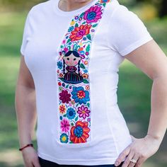 Beautiful One Of A Kind T-Shirt, Features A Mexican Doll Design With Colorful Flowers, This Is A Great Gift For The Mexican Culture Lover! Cute Embroidered Short Sleeve Tops, Pastel Blouse, Magenta Top, Royal Blue Top, Teal Blouse, Mexican Doll, Mexican Blouse, Cream Blouse, Mexican Embroidery