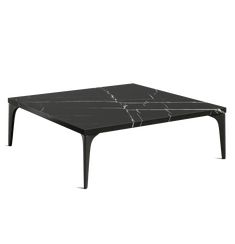 a black marble coffee table with metal legs