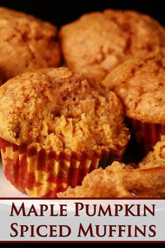 some muffins on a plate with the words maple pumpkin spiced muffins