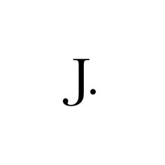 a black and white photo of the letter j in cursive writing with dots