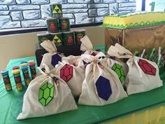 several bags filled with candy sitting on top of a table