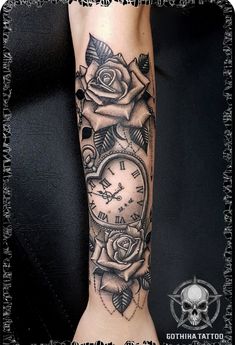 a black and white photo of a rose with a clock on it's arm