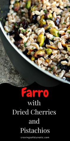 farro with dried cherries and pistachios in a pan on a table