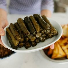 Best Lebanese Stuffed Grape Leaves Recipe (Warak Enab) Grape Leaves Recipe Lebanese, Stuffed Grape Leaves Recipe, Warak Enab, Grape Leaves Recipe, Stuffed Grape Leaves, Ground Lamb, Lebanese Recipes, Food Board, Arabic Food