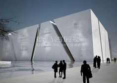 people are walking around in front of a large building with an unusual design on it