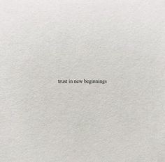 the words trust in new beginnings written on white paper