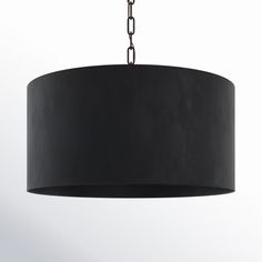 a black chandelier hanging from a ceiling