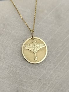 9K Real Solid Gold Necklace, Hallmarked on the back of your pendant for certification! Moth Necklace - Engraved Butterfly Charm - Gold Moon Moth Charm - Gold Moth Pendant ▪️ A beautiful and clean engraved Ballerina pendant made out of 9K Solid Real Gold. Available only in yellow gold! Pendant Thickness: 0.50mm Jump Ring inner diameter: 4mm Dimensions: - 13mm / 0.52 inches - 15mm / 0.59 inches - 18mm / 0.70 inches - 20mm / 0.78 inches - 22mm / 0.86 inches - 24mm / 0.94 inches Necklace Length - Yo Gold Moth Necklace, Engraved Pendant Necklace, Gold Charm Necklace Pendants, Luna Moth Necklace, Afro Jewelry, Moth Pendant, Moth Necklace, Moon Moth, Animal Necklace