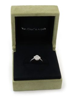 Brand: Van Cleef & Arpels Hallmark: VCA Au750 50 JE776845 Measurement: top: 9mm across x 9mm wide x 4mm high Ring Size: US: 5 European: 50 Diamond: 0.08ct F VVS1 Weight: 3.1 grams Comes with VCA certificate and box. This is gorgeous authentic ring is by Van Cleef & Arpels from the Sweet Alhambra collection. It is crafted from 18k white gold in a fine polished finish. The ring is in the design of VCA's famous four leaf clover set with loupe clean sparkling diamonds, it has fine polished g Van Cleef Alhambra Ring, Van Cleef And Arpels Ring, Van Cleef White Gold, Van Cleef Ring, Van Cleef Arpels Ring, Van Cleef Alhambra, Pink Vans, Van Cleef And Arpels, Gold Cocktail Ring