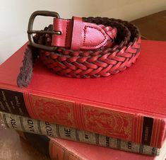 Vintage women's red leather braided belt accessories western country fashion waist ITEM DESCRIPTION: Offering this fashionable red leather braided adjustable belt. This belt is marked: "M". MEASUREMENTS: This any occasion belt measures approximately 39 1/2 inches long (including buckle) and 1 1/8 inches wide. The bronzed-tone metal buckle measures 1 3/4 inches tall and 1 7/8 inches wide. CONDITION: This belt is in good vintage condition; no issues detected. POLICIES: Please keep in mind, I am no Belt Buckles Womens, Vintage Retro Decor, Theatre Stage, Country Fashion, Braided Belt, Belt Accessories, Suspender Belt, Adjustable Belt, Vintage Wear