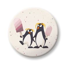 two penguins with ice cream on their backs